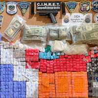 20 LBs Of Coke, $100K In Cash, Guns: Drug Ring Bust Nabs 8 In Springfield, Police Say
