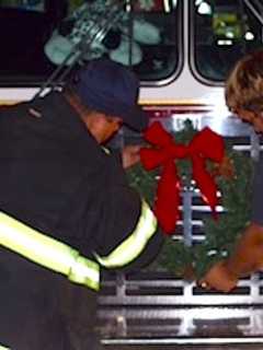 Santa Arrives In Style For Downtown Danbury Firetruck Parade