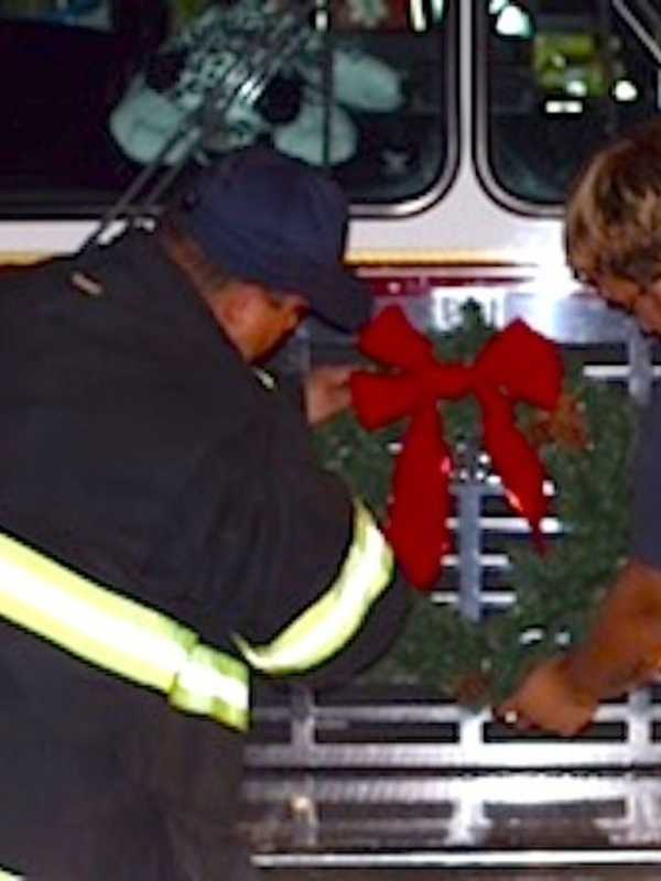 Santa Arrives In Style For Downtown Danbury Firetruck Parade
