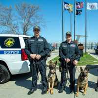 <p>Port Authority Police Officer Erik Brozek (with Cirri), Officer Kevin Duffy (with Perry) and Steven Paluzzi (with Vinny).</p>