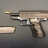 <p>State troopers found the loaded  9mm handgun in the trunk of the car.</p>