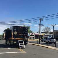 <p>Investigators were concentrated in the area of a Portland Avenue parking lot behind a string of South Washington Avenue businesses across from the Roy W. Brown Middle School.</p>