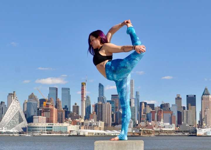 Cheryl Feinberg of River Vale balances at the Weehawken Waterfront.