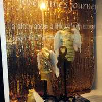 <p>The gold-themed Westwood storefront is raising awareness for pediatric cancer.</p>