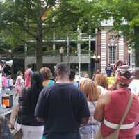 <p>A crowd gathers on the McLevy Green in Bridgeport on Sunday for a vigil to protest violence in Charlottesville.</p>