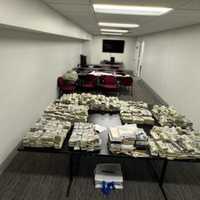 <p>Some of the cash and drugs.&nbsp;</p>