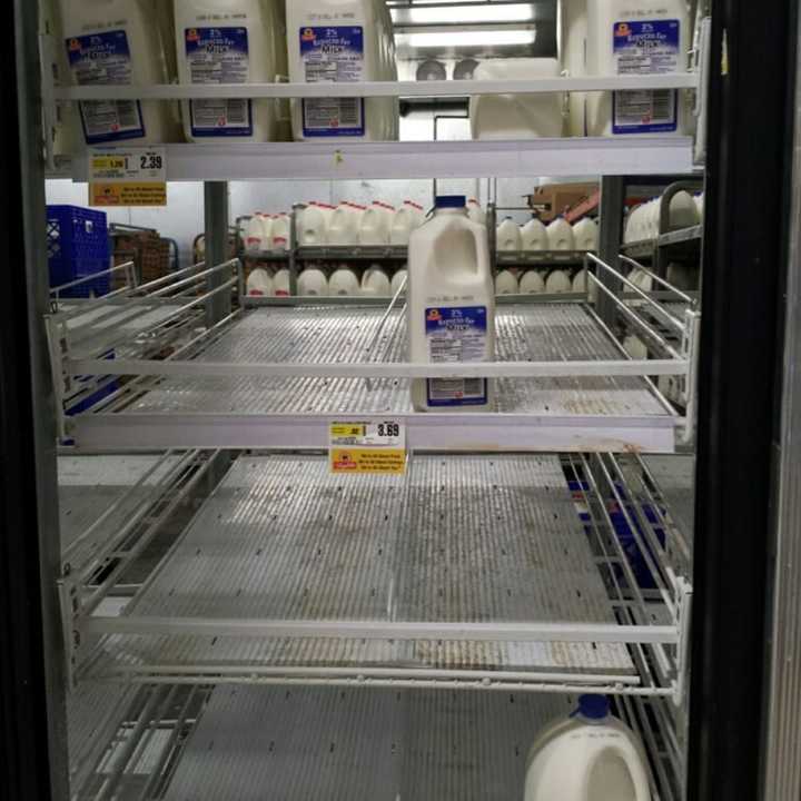 Shelves were looking empty in the milk department at ShopRite in Ramsey Sunday night ahead of the storm.