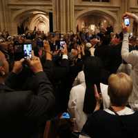 <p>Thursday evening just before a Vespers service as thousands of people -- including four nuns from the Mariandale Convent -- take personal photos of Pope Francis as he proceeds into St. Patrick&#x27;s Cathedral.</p>