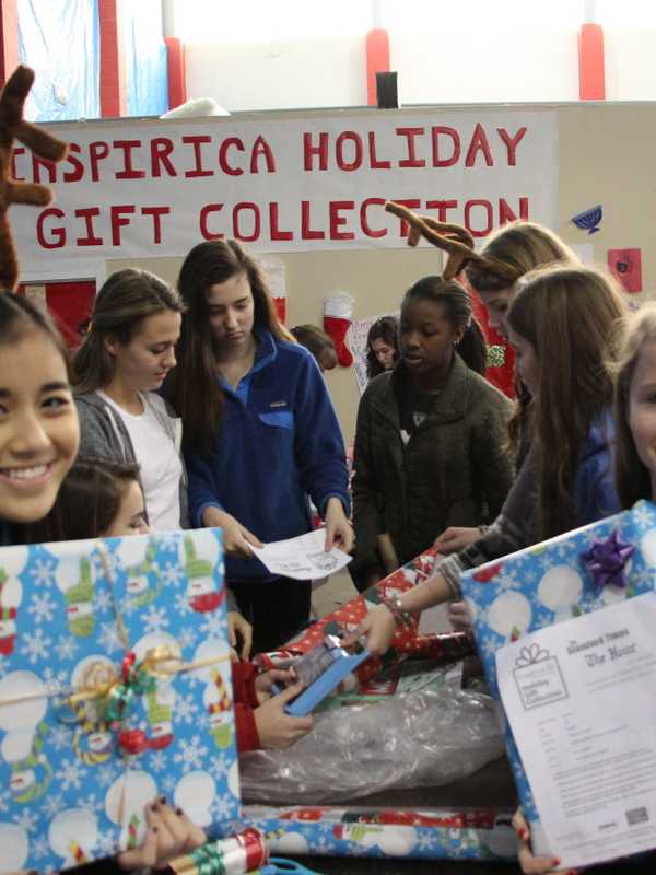 Norwalk's TFI Envision Collects Holiday Gifts For Inspirica