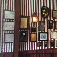 <p>Some of the community awards on display at The Iron Horse in Westwood.</p>