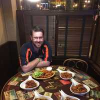 <p>Co-Owner Sean Tremble with wings served at The Iron Horse in Westwood.</p>