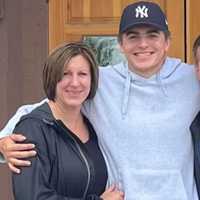 <p>Jim Weydig with his wife, Paula, and son, Ryan.</p>