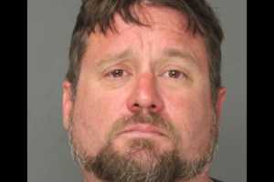 Police: Berks Driver Yelling Racial Slurs Arrested For Striking Woman, Almost Hitting Officers