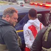 <p>Demario Julian being arrested by US Marshals in Chester, Pa.</p>