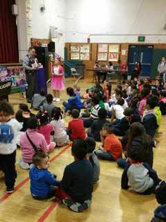 Norwalk Police Bring Gifts To 150 Kids At Holiday Party
