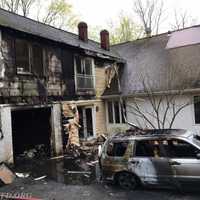 <p>The rear of a Mount Kisco home sustained damage when a car fire spread to the structure.</p>