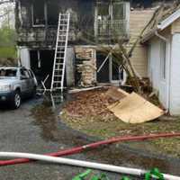 <p>The rear of a Mount Kisco home sustained damage when a car fire spread to the structure.</p>