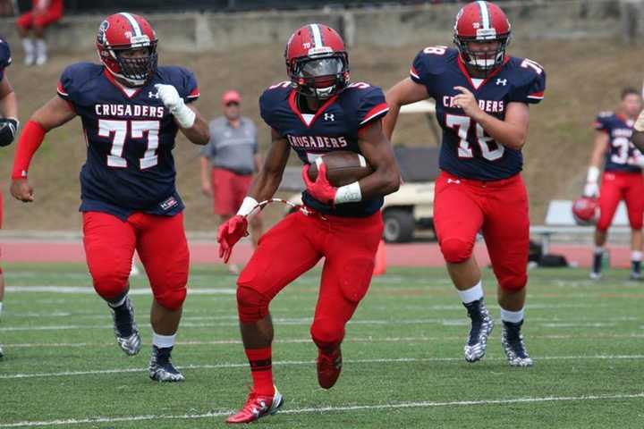 Kobe Miranda runs for Archbishop Stepinac during last week&#x27;s win over Iona Prep.