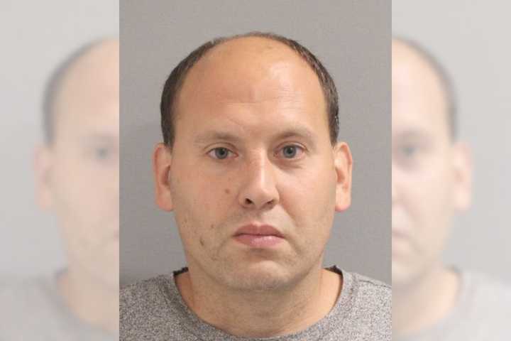 Levittown resident Paul S. Krill, aged 34, was arrested on the afternoon of Monday, June 13 after police say they found dozens of cases containing assorted fireworks in his garage.