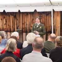 <p>Superintendent Linda Cook welcomes family members and dignitaries to the official opening of the Weir House in May 2014.</p>