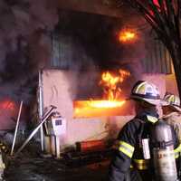 <p>Firefighters battle flames at Lodi building on Main Street.</p>