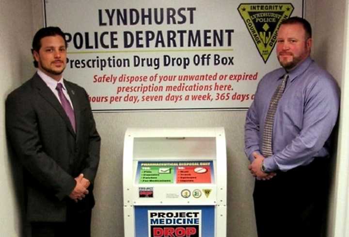 Lyndhurst Police Sgt. Richard Pizzuti (left), Public Safety Commissioner John Montillo, Jr. 