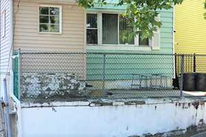 Paterson Mom, Son Charged With Operating Fortified Drug Mill: 23 Pounds Of Pot, $38,630 Seized