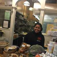 <p>Megan Bartley, from Fox Lane High School, working the Ladle counter.</p>