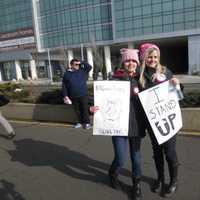 <p>Lisa Boyne, right, protests with her daughter, Kristen Alafriz, at the Stamford march.</p>