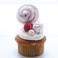 <p>Egg-free meringue lollipops decorate cupcakes at the Meringue Shop in Scarsdale.</p>