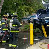 Sedan Impaled, Driver Injured In River Edge Crash