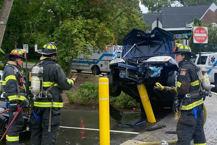 Sedan Impaled, Driver Injured In River Edge Crash