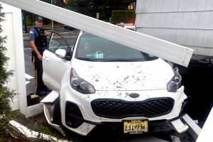 Out-Of-Control SUV Smacks Into Garage, Fence, Gate In Paramus