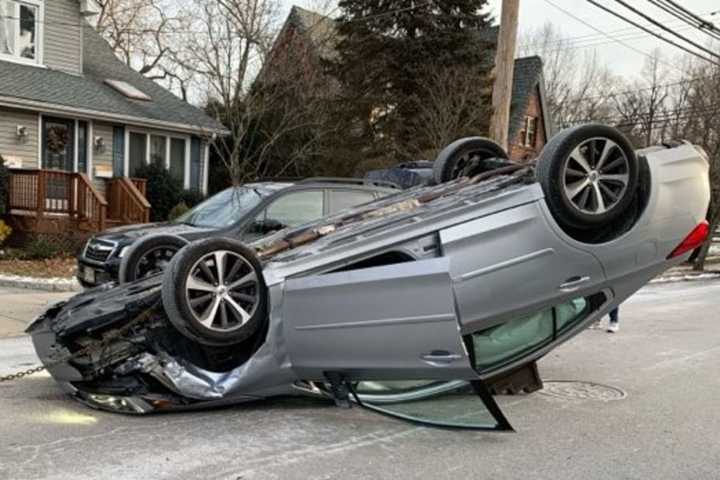 Sedan Overturns Outside Bergen County Grammar School