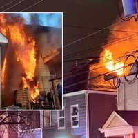 <p>The fire destroyed one building and damaged another on Harrison Street in Passaic.</p>