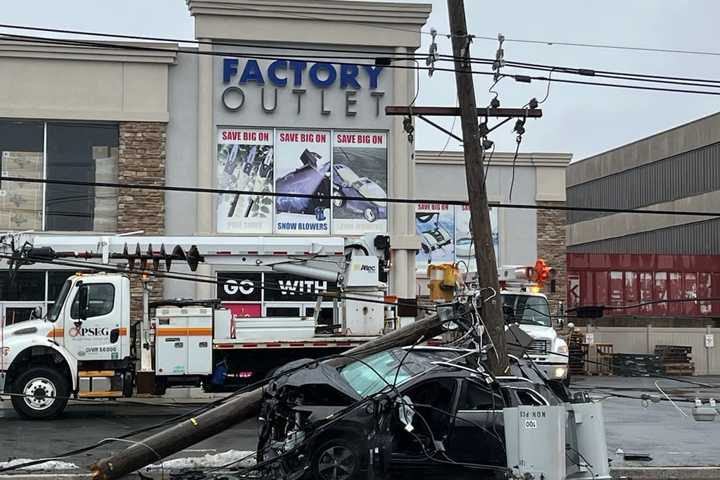 Driver Escapes Injury As Jeep Splits Pole In North Jersey