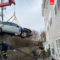 Driver OK After Sedan Careens Off Garden State Parkway Into Townhouse