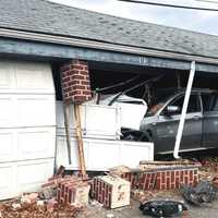 <p>Paterson firefighters shored up the row of garages at the Elmwood Terrace garden apartments with help from property managers, police said.</p>