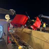 <p>The cab was up against the divider on Route 80.</p>