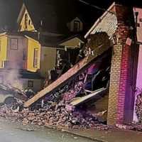 <p>Moments after the SUV struck the auto repair shop in Bergenfield.</p>