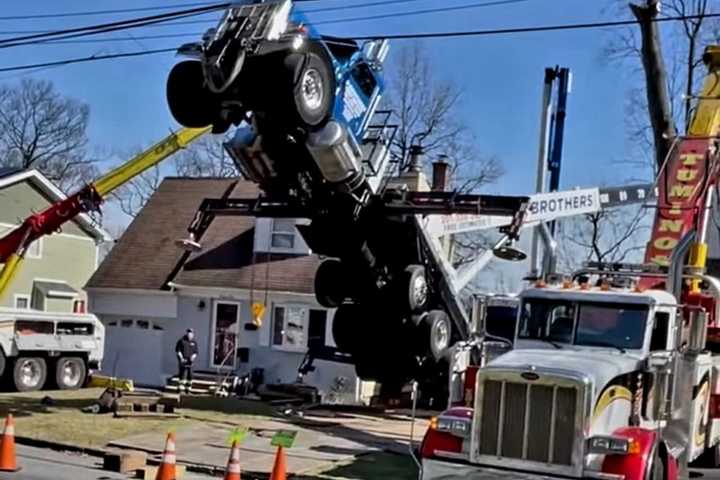 Tree Service Crane Topples, Dangles In Bergen Neighborhood