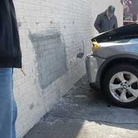 <p>The BMW X series SUV smacked into the side of the Rock Road building on Wednesday, April 19.</p>