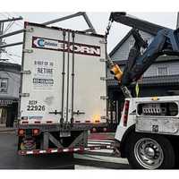 <p>The rig was headed east on Main Street when the driver tried to make a right onto John Street in Fort Lee.</p>