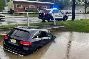 HEROES: Bergen Mom, Son Rescued From Rising Floodwaters