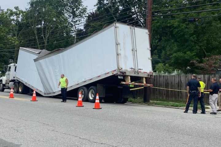 Trailer In Washington Township Gives Way Under Weight Of Scrap