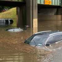 FLASH FLOOD: Motorists Rescued, Vehicles Float, Roads Jammed Throughout Area