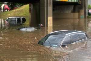 FLASH FLOOD: Motorists Rescued, Vehicles Float, Roads Jammed Throughout Area