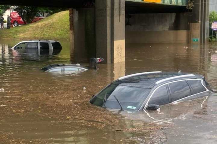 FLASH FLOOD: Motorists Rescued, Vehicles Float, Roads Jammed Throughout Area