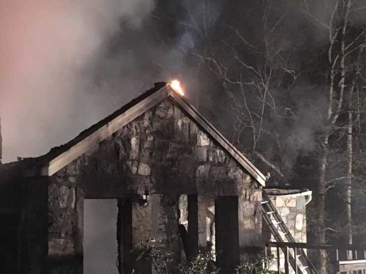 A fire gutted a Monroe home that was being renovated.