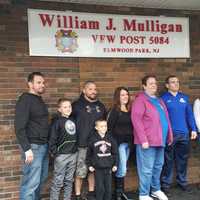 <p>Kathryn Mulligan is flanked by sons Tom, Pat, Billy, daughter-in-law Linda, and grandchildren Matty, Biily Jr. and Kayla.</p>